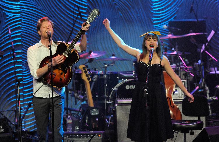 Neyla Pekarek, right, and Wesley Schultz of the band The Lumineers perform at the Clive Davis Pre-GRAMMY Gala on Saturday, Feb. 9, 2013 in Beverly Hills, Calif. (Photo by Chris Pizzello/Invision/AP)