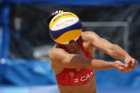<p>Melissa Humana-Paredes #2 of Team Canada returns the ball against Team Switzerland during the Women's Preliminary - Pool A beach volleyball on day six of the Tokyo 2020 Olympic Games at Shiokaze Park on July 29, 2021 in Tokyo, Japan. (Photo by Sean M. Haffey/Getty Images)</p> 
