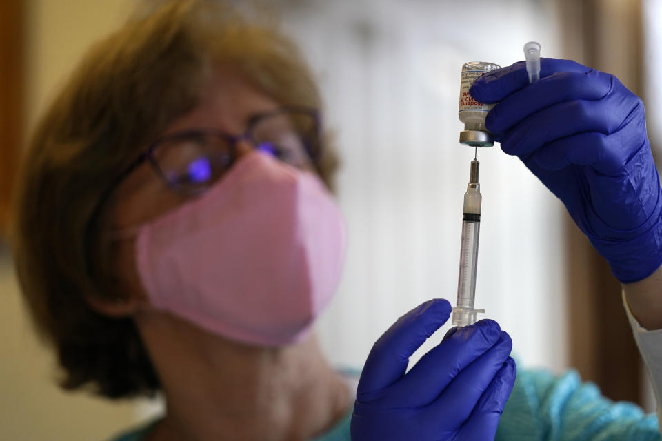 Nurse Maureen Giffen fills a syringe with a COVID-19 vaccination on the island of Islesford, Maine, Friday, March 19, 2021. (Robert F. Bukaty/AP)