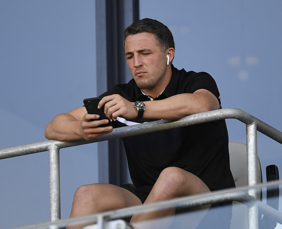 Sam Burgess looks on before the start the round 14 NRL match.