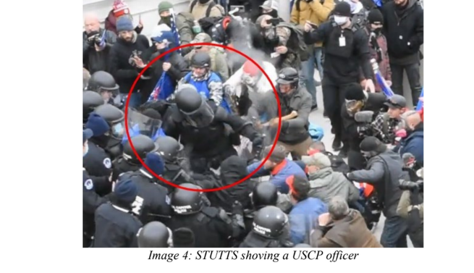 Lee Stutts of Lake Norman shoves a U.S. Capitol Police officer in this image included in an affidavit with the criminal indictment against him.