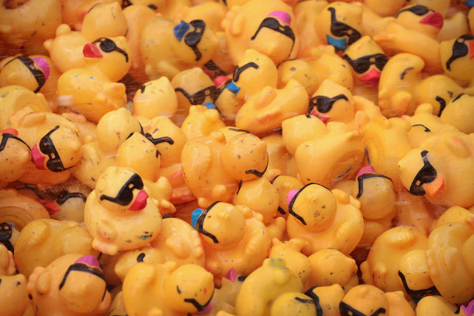 <p>A dump truck filled with 60,000 rubber ducks waits for the start of the Windy City Rubber Ducky Derby on August 3, 2017 in Chicago, Illinois. (Photo: Scott Olson/Getty Images) </p>