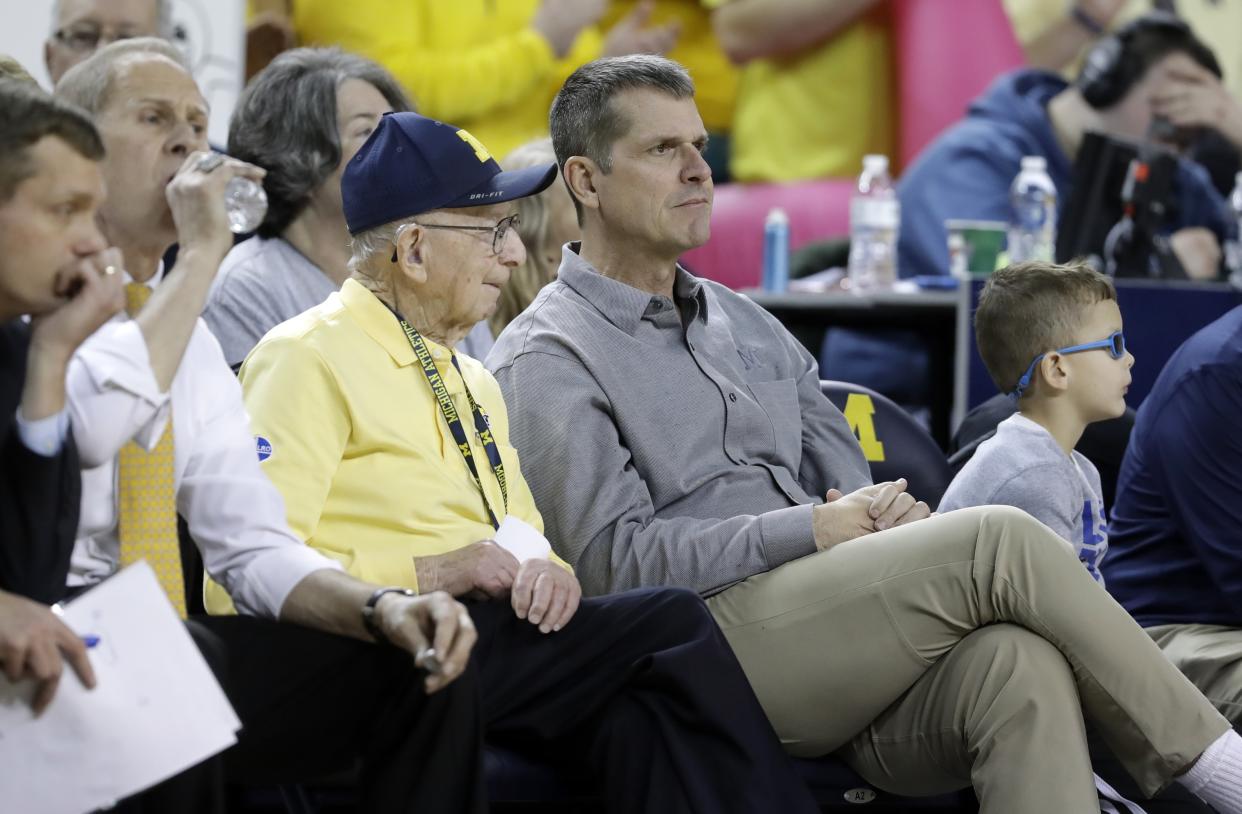 Michigan coach Jim Harbaugh (R) has his team in Rome. (AP Photo/Carlos Osorio)