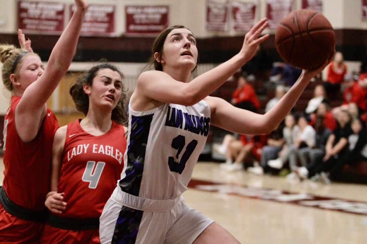 Stamford senior Audrey Brewer goes for a layup against Holliday on Wednesday, Dec. 29.