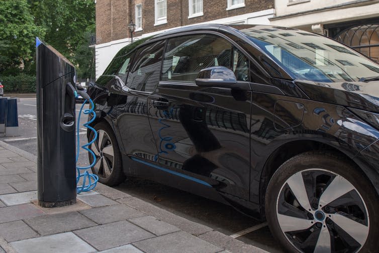 <span class="caption">To ensure the transition to electric transport is sustainable, the UK will need to decarbonise its electricity supply.</span> <span class="attribution"><a class="link " href="https://www.shutterstock.com/image-photo/electric-vehicle-charging-station-london-westminster-1058971523" rel="nofollow noopener" target="_blank" data-ylk="slk:Bubble_Tea Stock/Shutterstock;elm:context_link;itc:0;sec:content-canvas">Bubble_Tea Stock/Shutterstock</a></span>