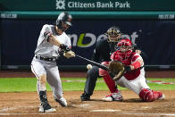 Arizona Diamondbacks' Corbin Carroll hits an RBI single against the Philadelphia Phillies during the fifth inning in Game 7 of the baseball NL Championship Series in Philadelphia on Tuesday, Oct. 24, 2023. (AP Photo/Matt Rourke)