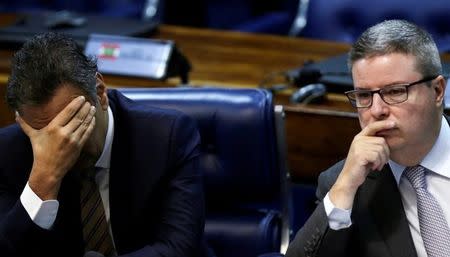 Senator Antonio Anastasia (R), rapporteur of the special senate committee, and Senator Aecio Neves attend a voting session on the impeachment of President Dilma Rousseff in Brasilia, Brazil, May 12, 2016. REUTERS/Ueslei Marcelino
