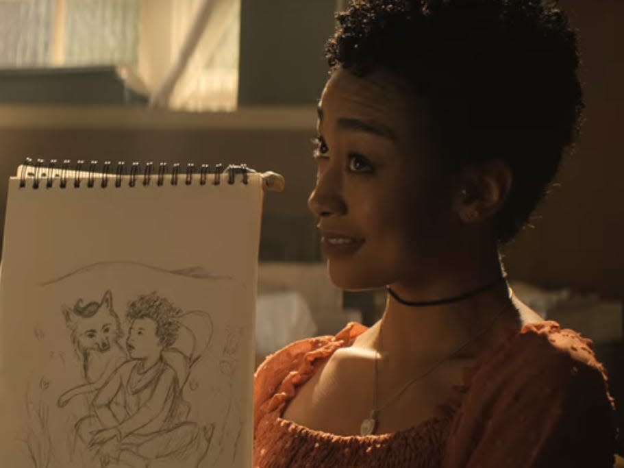 Marienne holding up a drawing on Netflix's "You."