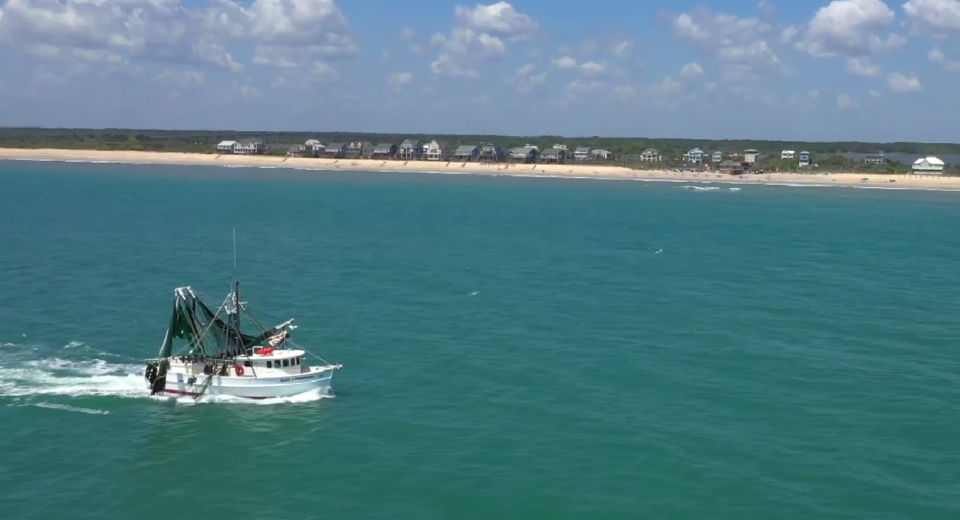 A boat enjoys the water off North Topsail Beach.