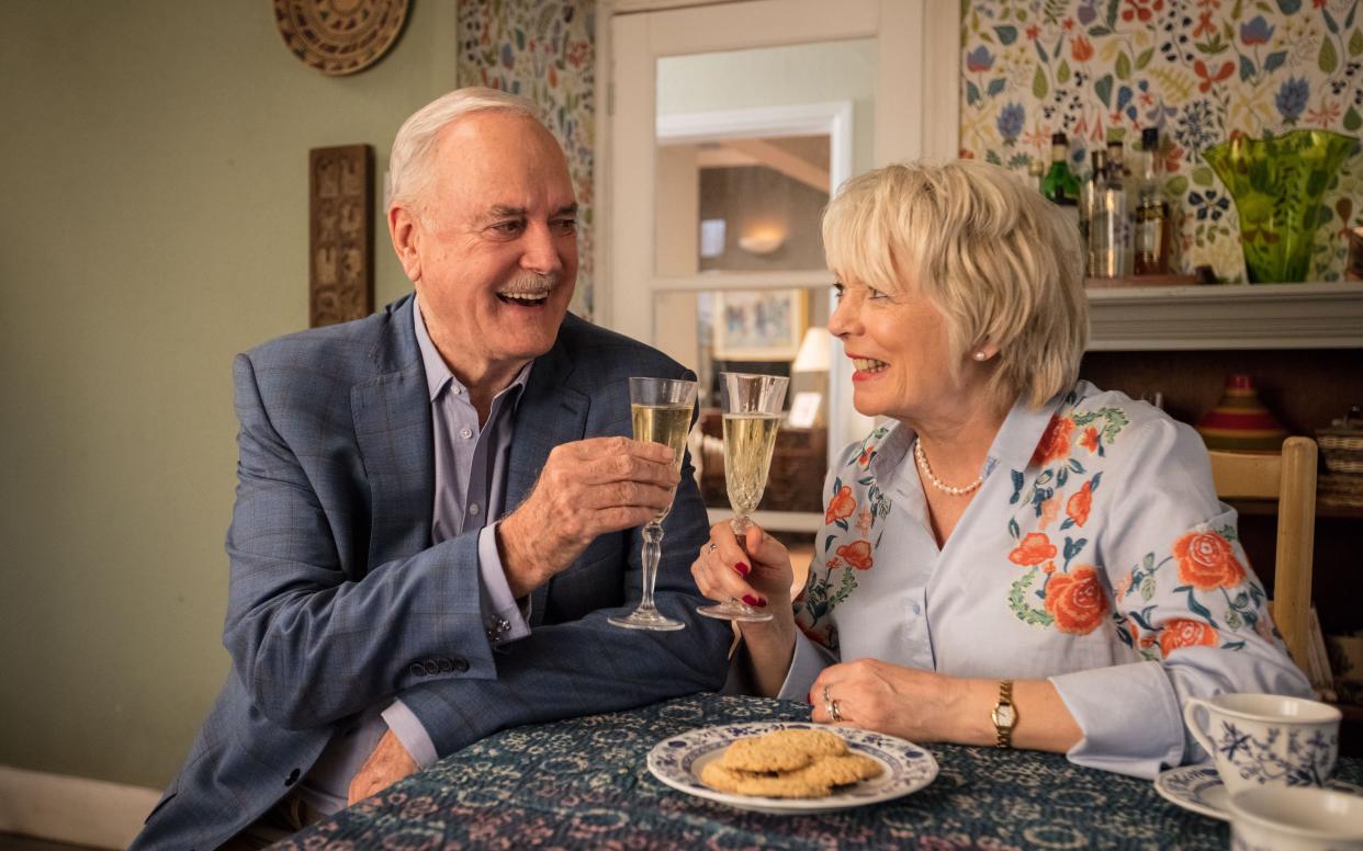 Happy return: John Cleese, here with Alison Steadma, made his TV comeback in ‘Hold the Sunset’ - WARNING: Use of this copyright image is subject to the terms of use of BBC Pictures' Digital Picture Service (BBC Pictures) as set out at www.bbcpictures.co.uk. In particular, this image may only be published by a registered User of BBC Pictures for editorial use for the purpose of publicising the relevant BBC programme, personnel or activity during the Publicity Period which ends three review weeks following the date of transmission and provided the BBC and the copyright holder in the caption are credited. For any other purpose whatsoever, including advertising and commercial, prior written approval from the copyright holder will be required.