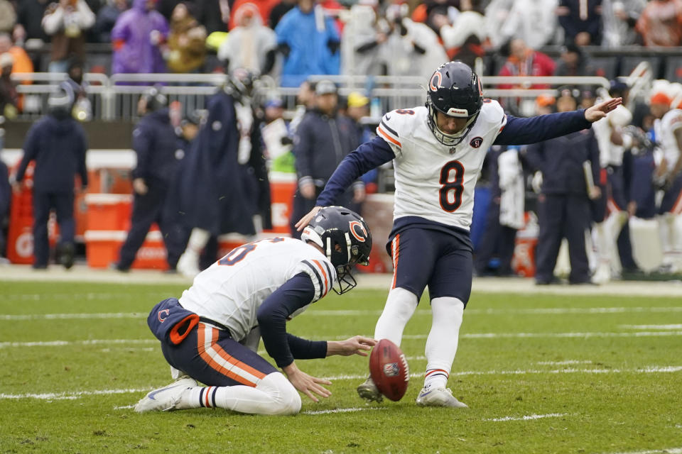 Chicago Bears place-kicker Cairo Santos (8) kicks the ball in the first half of an NFL football game against the Cleveland Browns in Cleveland, Sunday, Dec. 17, 2023. (AP Photo/Sue Ogrocki)