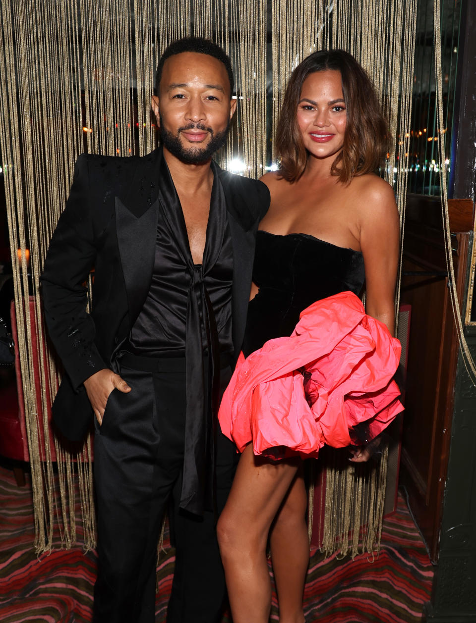 LOS ANGELES, CALIFORNIA - FEBRUARY 04: (L-R) John Legend and Chrissy Teigen attend W Magazine, Mark Ronson, and Gucci's Grammy After-Party at Bar Marmont on February 04, 2024 in Los Angeles, California. (Photo by Jerritt Clark/Getty Images for W Magazine)