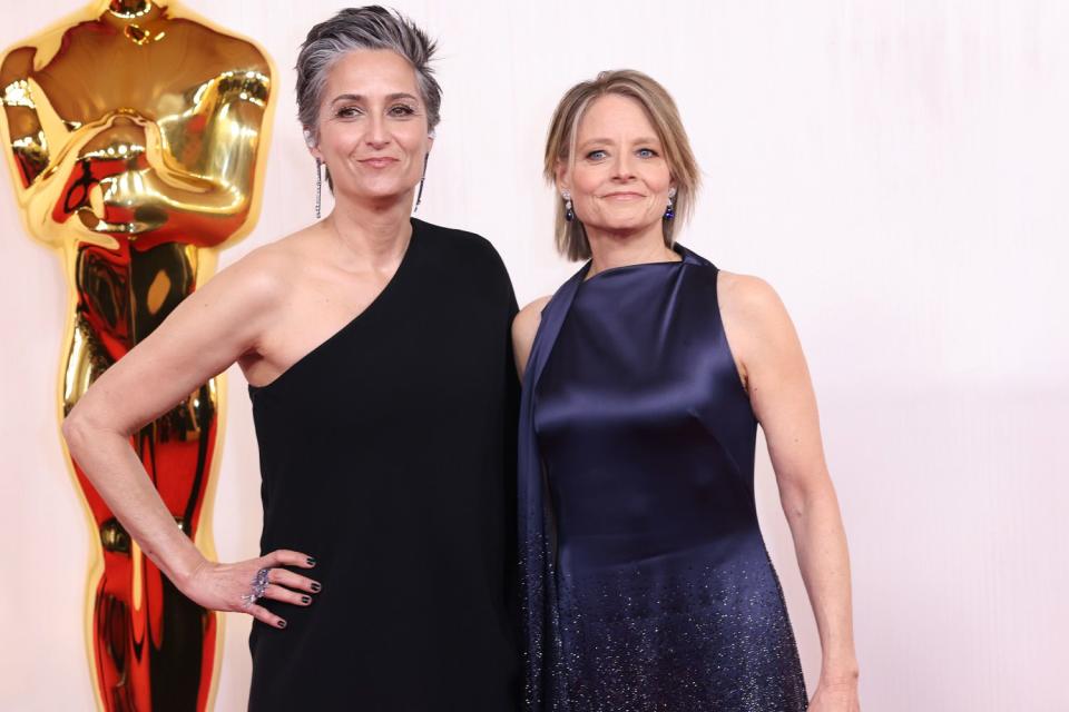 <p>Christina House / Los Angeles Times via Getty</p> Alexandra Hedison and Jodie Foster arrive at the 96th Academy Awards