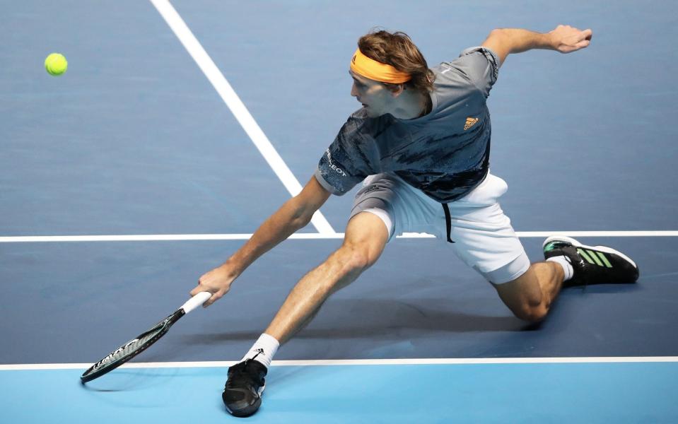 At full stretch: Alexander Zverev plays a backhand during his victory over Daniil Medvedev - Getty Images Europe