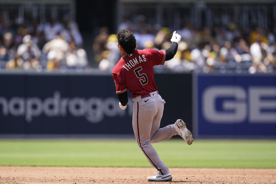 Arizona Diamondbacks' Alek Thomas reacts after hitting a home run during the third inning of a baseball game against the San Diego Padres, Wednesday, June 22, 2022, in San Diego. (AP Photo/Gregory Bull)