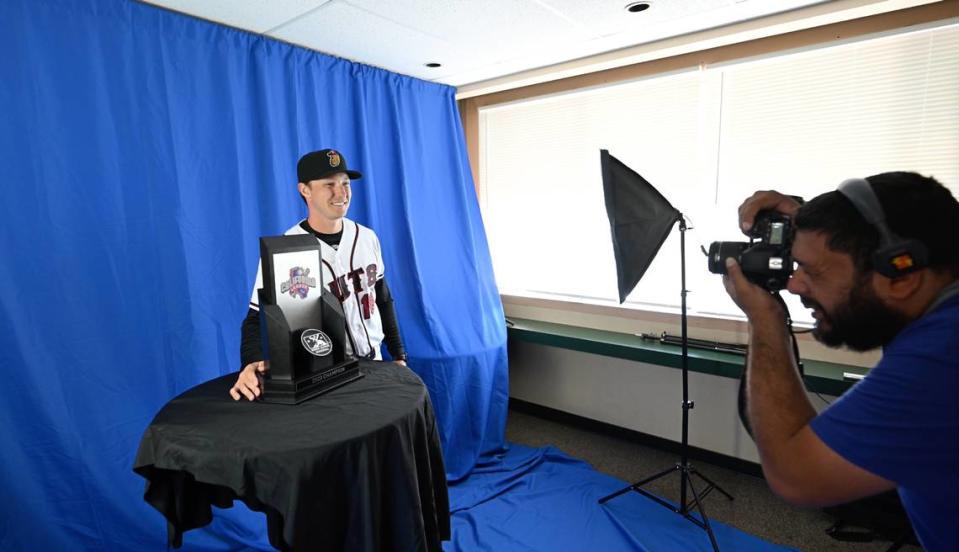 Modesto Nuts manager Zach Vincej poses with the California League Championship trophy during media day at John Thurman Field in Modesto, Calif., Tuesday, April 2, 2024.