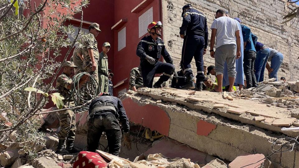 PHOTO: Rescuers carry a search operation following a powerful earthquake, in Amizmiz, in Morocco, Sept. 9, 2023. (Abdelhak Balhaki/Reuters)