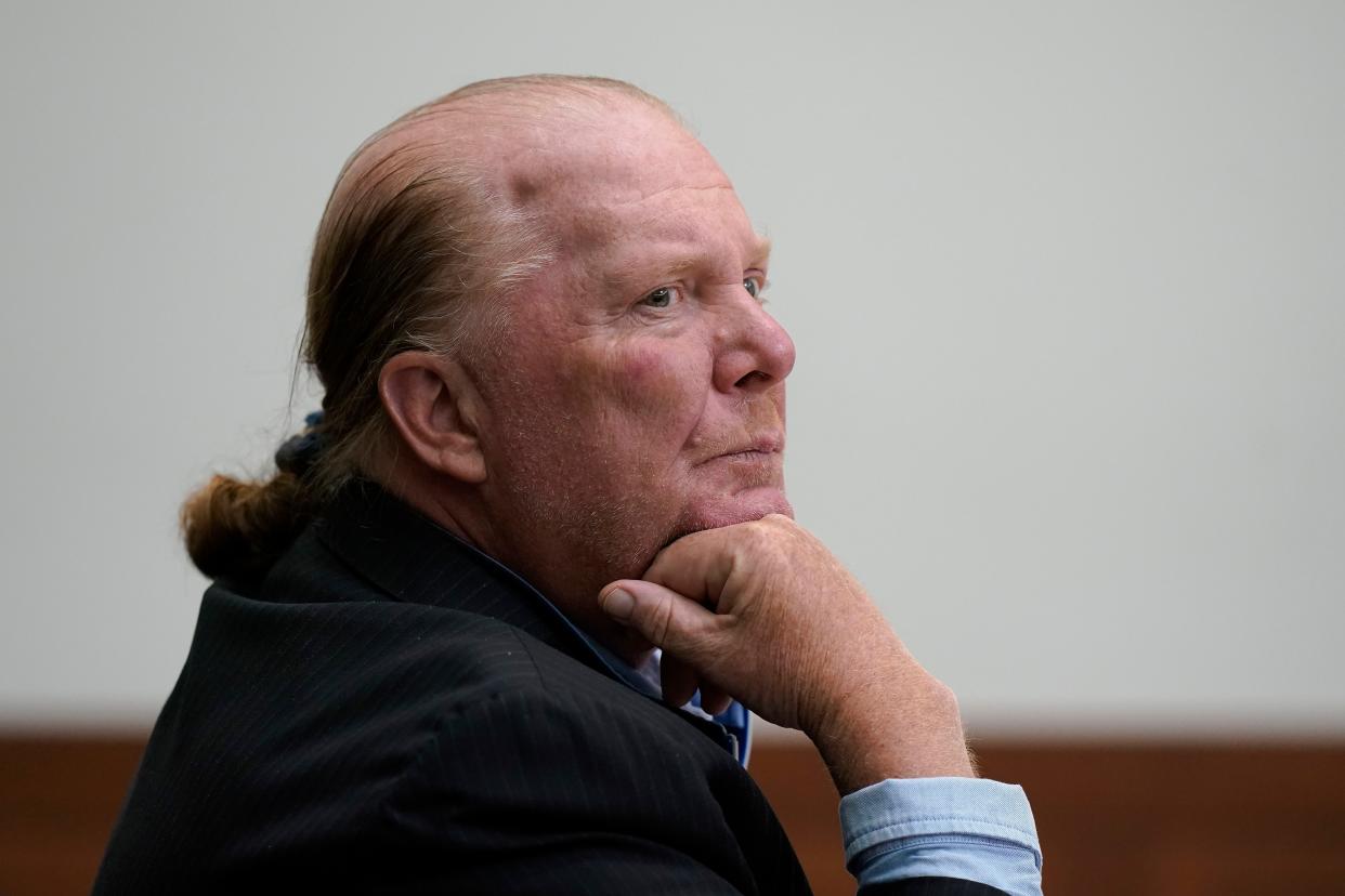 Celebrity chef Mario Batali listens at Boston Municipal Court on the first day of his pandemic-delayed trial on May 9, 2022, in Boston. 