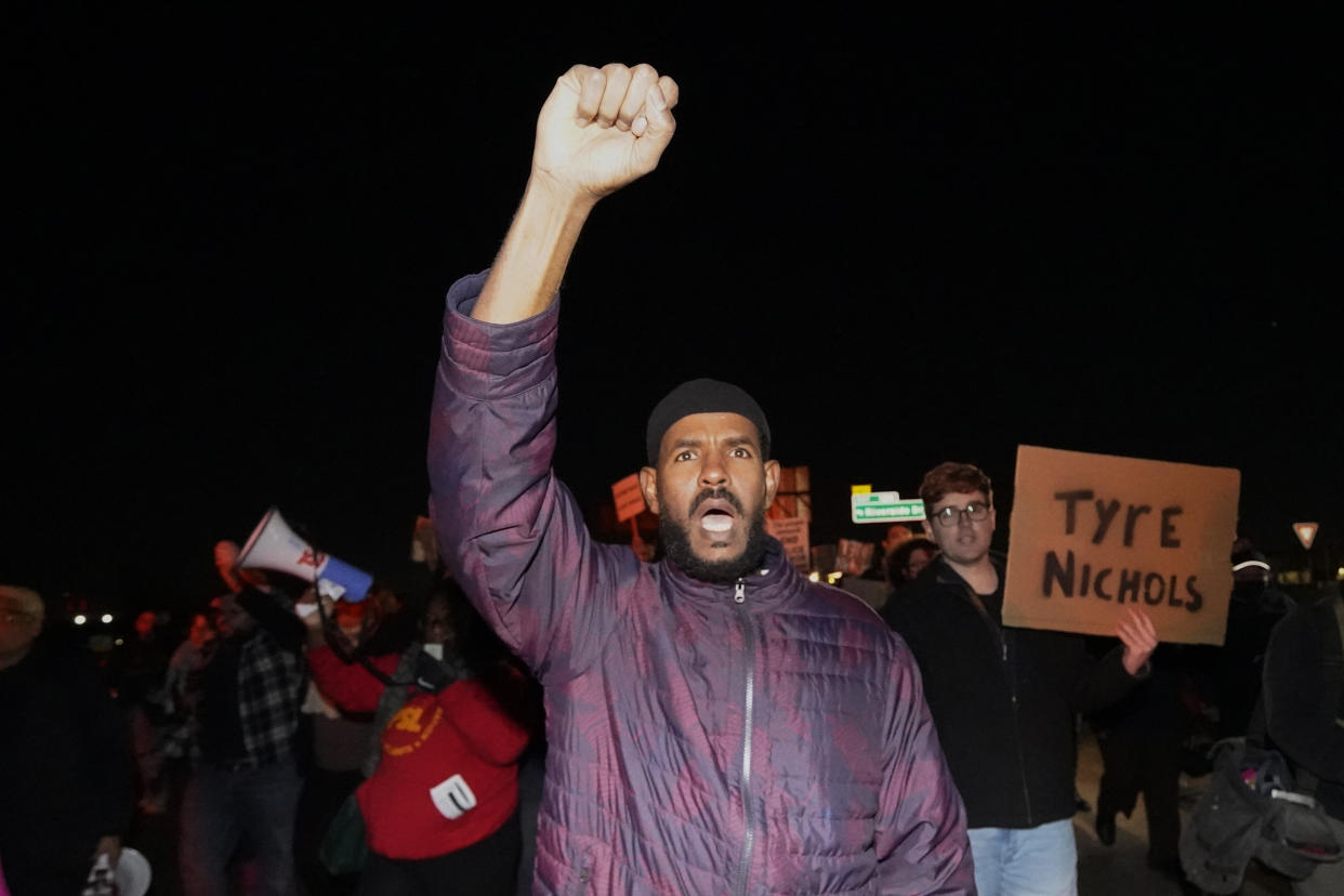 Protesters march Friday, Jan. 27, 2023, in Memphis, Tenn., as authorities release police video depicting five Memphis officers beating Tyre Nichols, whose death resulted in murder charges and provoked outrage at the country's latest instance of police brutality. (AP Photo/Gerald Herbert)