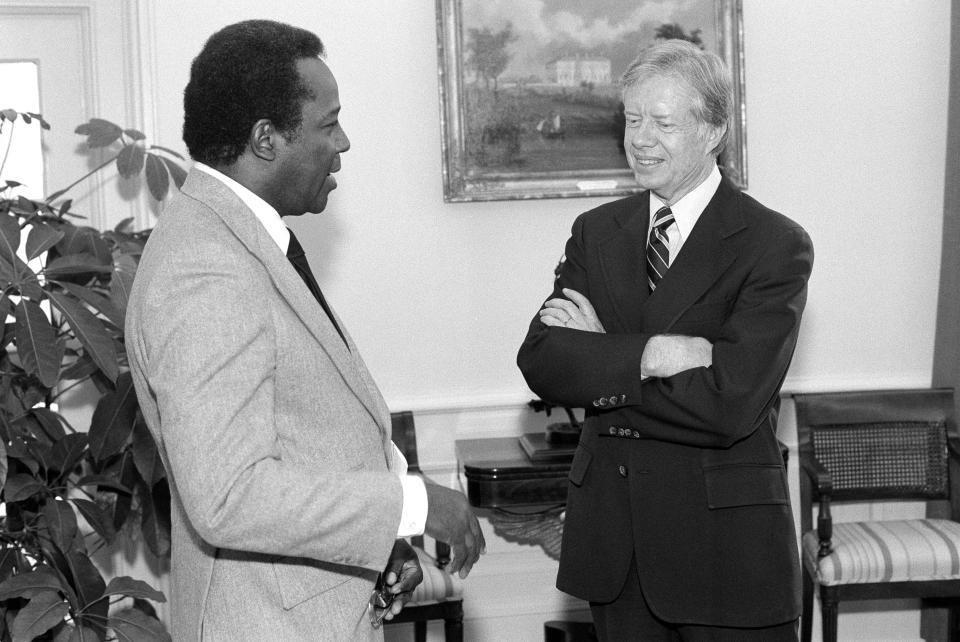 FILE - In this April 30, 1980 file photo, Mayor Richard Hatcher of Gary, Ind., chairman of the Conference of Black Mayors, meets with President Jimmy Carter at the White House in Washington. On Friday, Dec. 13, 2019, Hatcher, who became one of the first black mayors of a big U.S. city when he was elected in 1967, died. He was 86. (AP Photo)