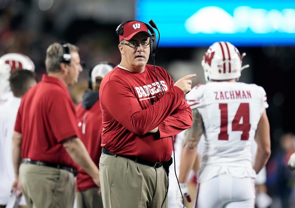 Sep 24, 2022; Columbus, Ohio, USA; Wisconsin Badgers head coach Paul Cryst asks about a no call on a play to a referee in the third quarter of the NCAA football game between Ohio State Buckeyes and Wisconsin Badgers at Ohio Stadium. 