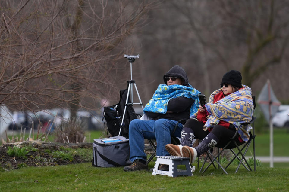 People gather at Niagara Falls State Park ahead of a total solar eclipse across North America on April 8, 2024 in Niagara Falls, Ontario, Canada.