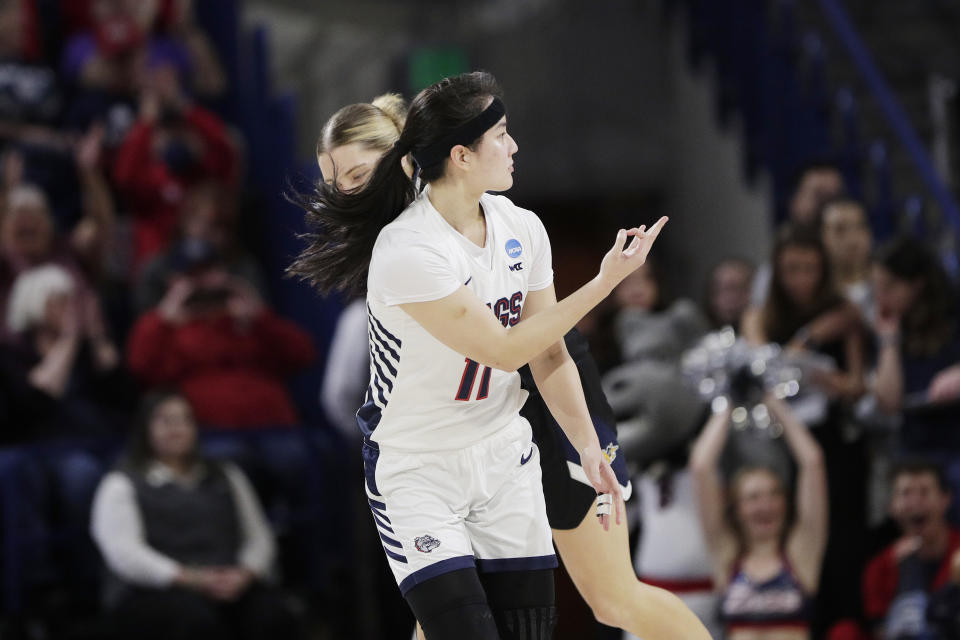 Gonzaga guard Kayleigh Truong (11) gestures after scoring against UC Irvine during the second half of a first-round college basketball game in the women's NCAA Tournament in Spokane, Wash., Saturday, March 23, 2024. (AP Photo/Young Kwak)