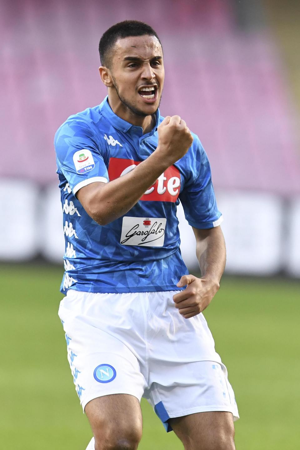 Napoli's Adam Ounas celebrates after scoring his side's second goal during the Serie A soccer match between Napoli and Frosinone, at the San Paolo stadium in Naples, Italy, Saturday, Dec. 8, 2018. (Ciro Fusco /ANSA via AP)