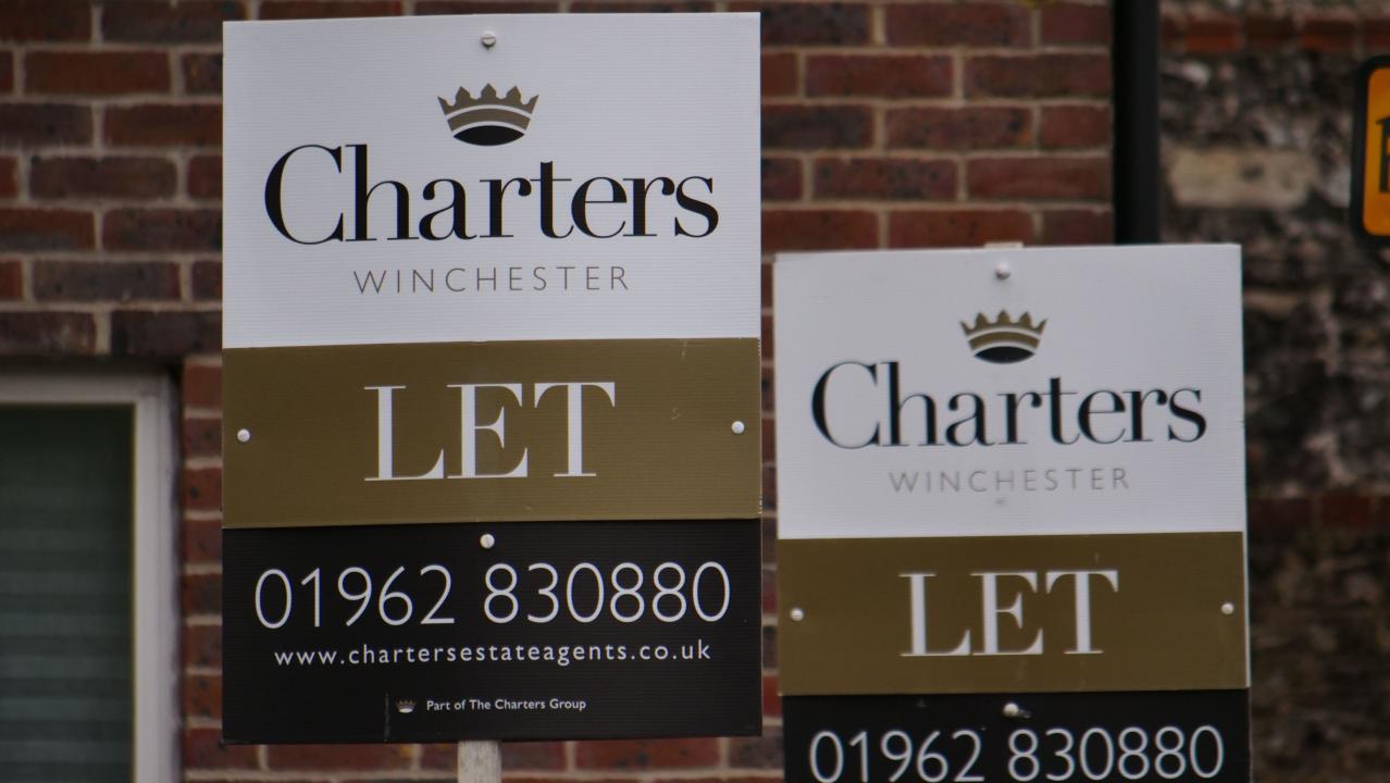 Property to rent with tO Let signs outside a block of flats in Winchester, Hampshire