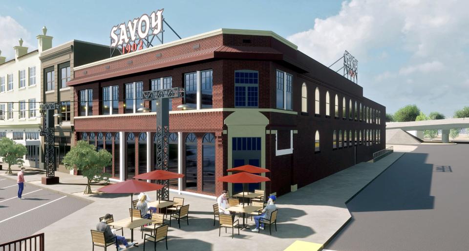 The former Savoy Hotel, shown in this rendering, will be anchored with a barbecue and deli once renovations are completed.