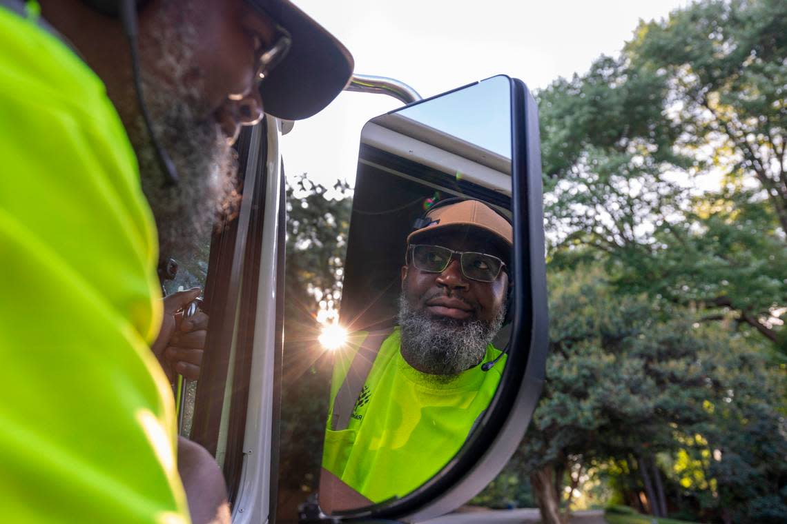 Raleigh Solid Waste Services employee Alonzo Adams photographed in his truck on Wednesday, July 17, 2024 in Raleigh, N.C. Adams collects household waste from between 1,000 to 1,200 residences during his shift.