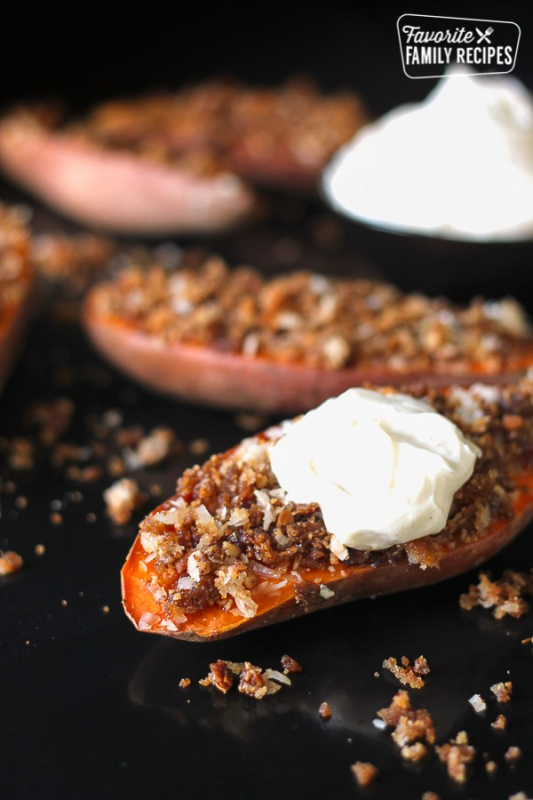 <p>Favorite Family Recipes</p><p>Coconut Pecan Sweet Potato Halves are a fun, unique way to have your Thanksgiving sweet potatoes. They have a brown sugar coconut pecan crust and are topped with a cinnamon marshmallow cream.</p><p><strong>Get the recipe</strong>: <a href="https://www.favfamilyrecipes.com/sweet-potato-halves/" rel="nofollow noopener" target="_blank" data-ylk="slk:Coconut Pecan Sweet Potato;elm:context_link;itc:0;sec:content-canvas" class="link rapid-noclick-resp"><strong>Coconut Pecan Sweet Potato</strong></a></p>