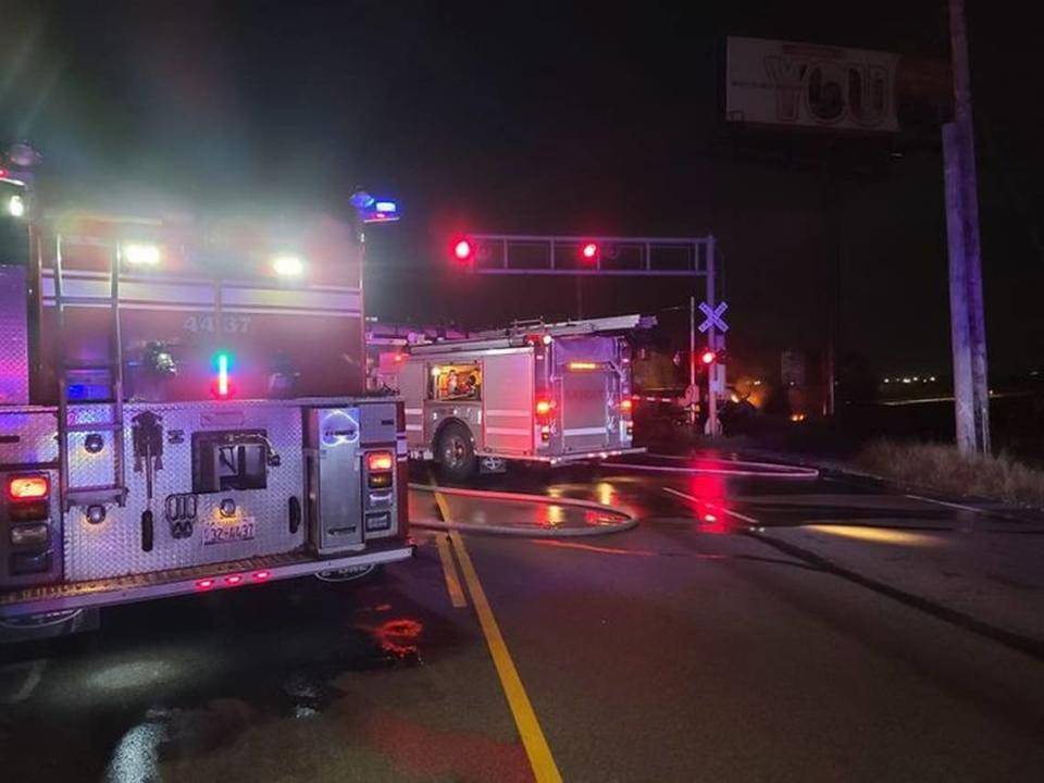 This photo posted at 3:09 a.m. Saturday on the Facebook page of Herb Simmons, executive director of St. Clair County Emergency Management Agency, shows fire trucks at the site of a crash involving a train and a truck in Sauget.