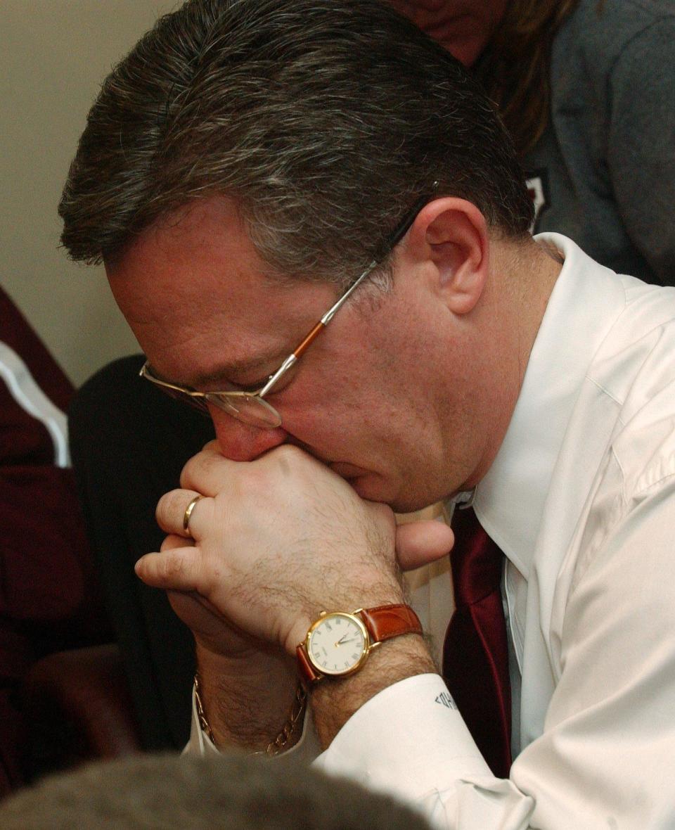 When he senses his chance for NCAA Tournament is dwindling coach Barry Hinson shows his somberness during the watch party at his home on Sunday.