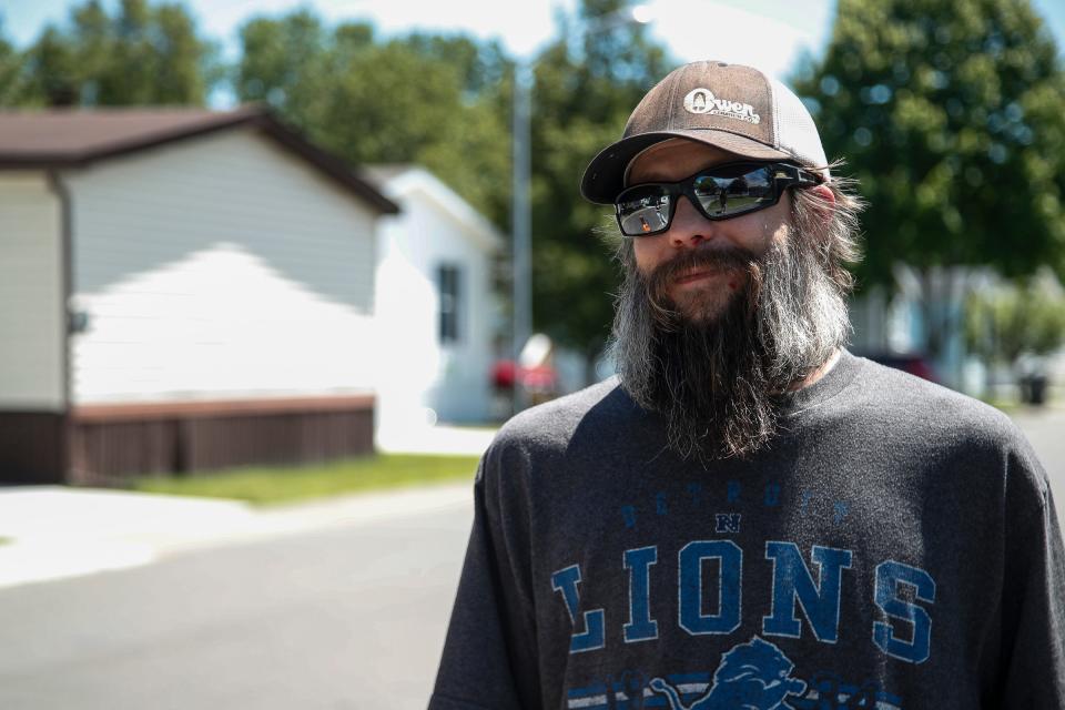 Adam Urquhart was with his son Adam Urquhart Jr., 8, fishing at the pond in the Dequindre Estates in Shelby Township on Saturday when police poured into the neighborhood looking for Brooklands Plaza Splash Pad shooting suspect Michael William Nash.