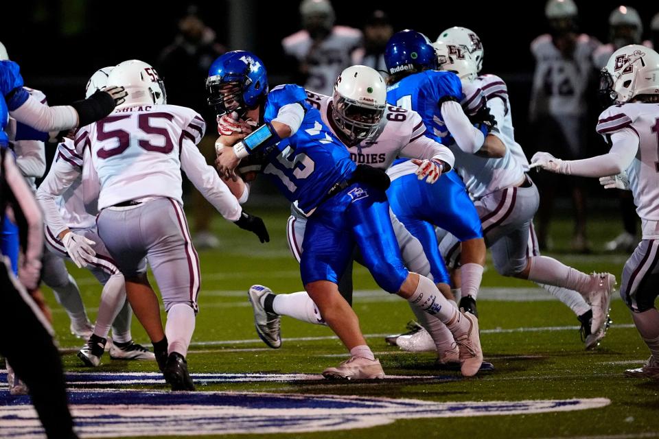 Lewiston High School and Edward Little High School football players compete during a high school football game, Wednesday, Nov. 1, 2023, in Lewiston, Maine. Locals seek a return to normalcy after a mass shooting on Oct. 25. (AP Photo/Matt York)