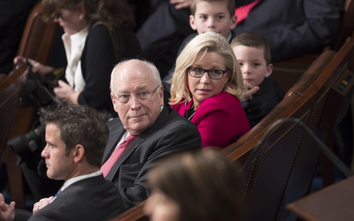 Former Vice President Dick Cheney, left, sits with his daughter, Rep. Liz Cheney (R-Wyo.), right, as the 115th Congress convenes on Capitol Hill in Washington, Jan. 3, 2017.