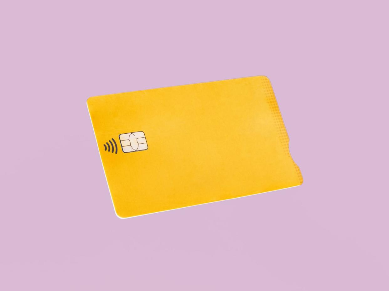 Yellow Credit Card On Pink Background