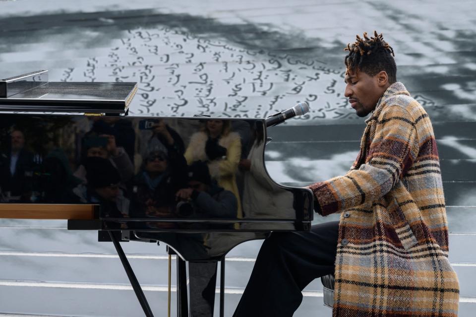 US singer Jon Batiste performs during the ‘Eyes on Iran’ exhibition press preview at Franklin D Roosevelt Four Freedoms State Park in New York City on 28 November 2022 (AFP via Getty Images)