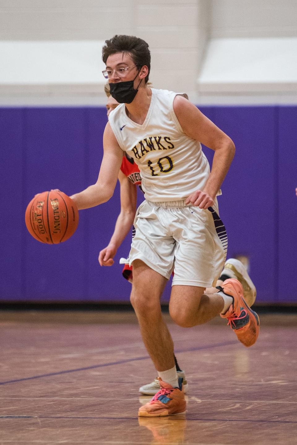 Rhinebeck's Bryce Aierstok drives up court during Friday's game against Onteora.