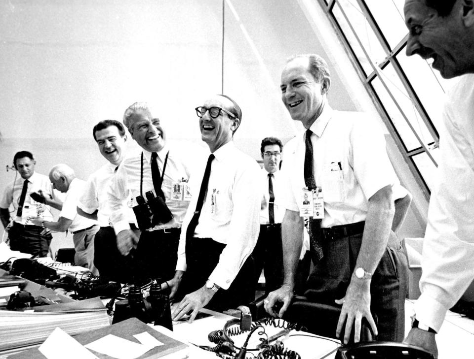 <p>Apollo 11 mission officials relaxing in the Launch Control Center at Kennedy Space Center on July 16, 1969.</p>