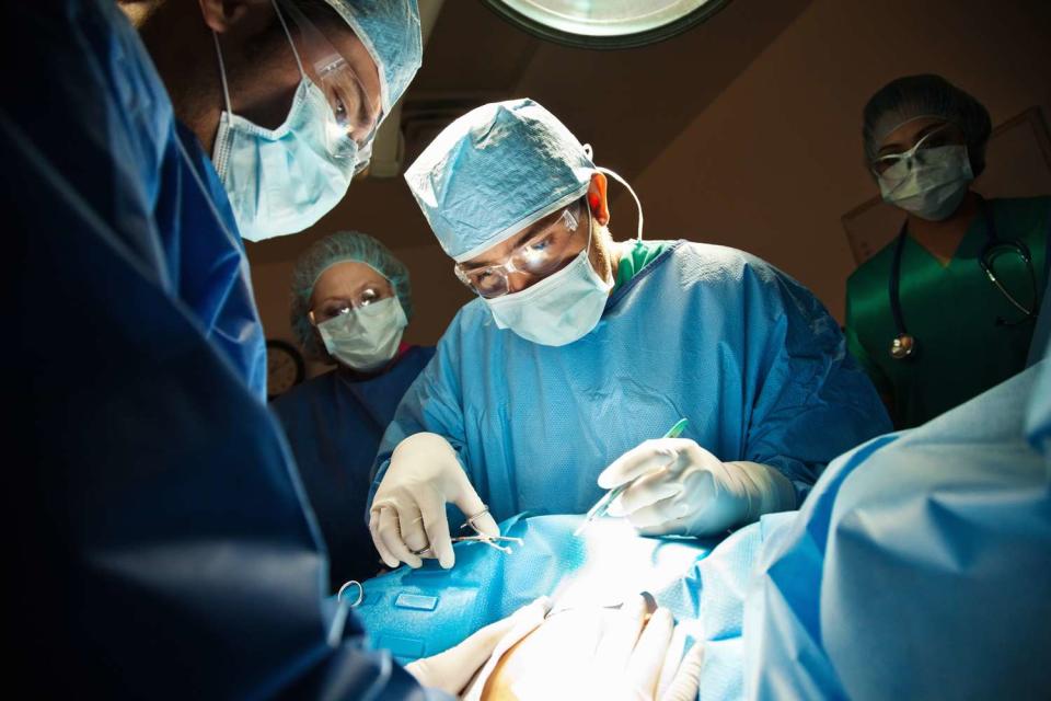 <p>Getty</p> Surgeons performing C-Section in operating room