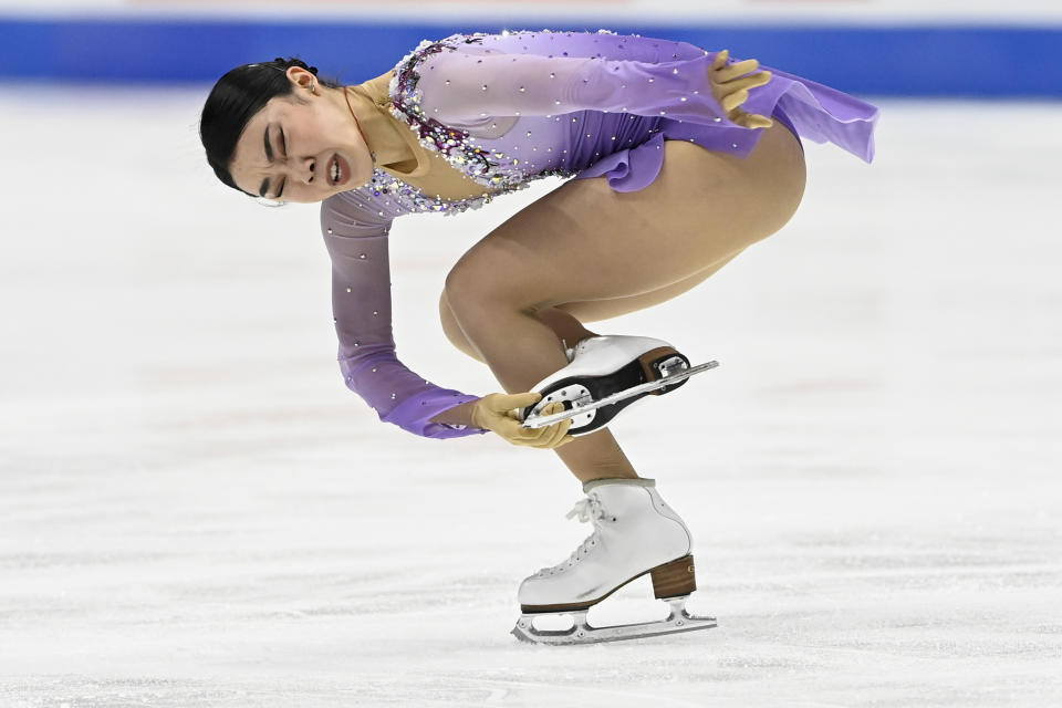 FILE- Karen Chen competes in the women's free skate program during the U.S. Figure Skating Championships Friday, Jan. 7, 2022, in Nashville, Tenn. At the Beijing Winter Games, opening Friday, Feb. 4, it's a homecoming of sorts for one of the world's most sprawling diasporas — often sweet and sometimes complicated, but always a reflection of where they are, where they come from and the Olympic spirit itself. U.S. women's singles figure skater Karen Chen, whose parents immigrated from Taiwan, says she identifies as both Taiwanese and Chinese, and uses those labels loosely and interchangeably. (AP Photo/Mark Zaleski, File)