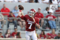 Oklahoma quarterback Spencer Rattler passes the ball against Western Carolina during the first half of an NCAA college football game Saturday, Sept. 11, 2021, in Norman, Okla. (AP Photo/Alonzo Adams)