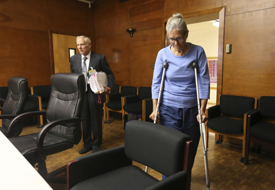 File - In this Sept. 6, 2017, file photo, Leslie Van Houten enters with her attorney Rich Pfeiffer before her parole board hearing at the California Institution for Women in Corona, Calif. California Gov. Gavin Newsom overruled a parole board's decision to free Charles Manson follower Leslie Van Houten on Monday, June 3, 2019, marking the third time a governor has stopped the release of the youngest member of Manson's murderous cult. Van Houten, 69, is still a threat, Newsom said, though she has spent nearly half a century behind bars and received reports of good behavior and testimonials about her rehabilitation. (Stan Lim/Los Angeles Daily News via AP, Pool, File)