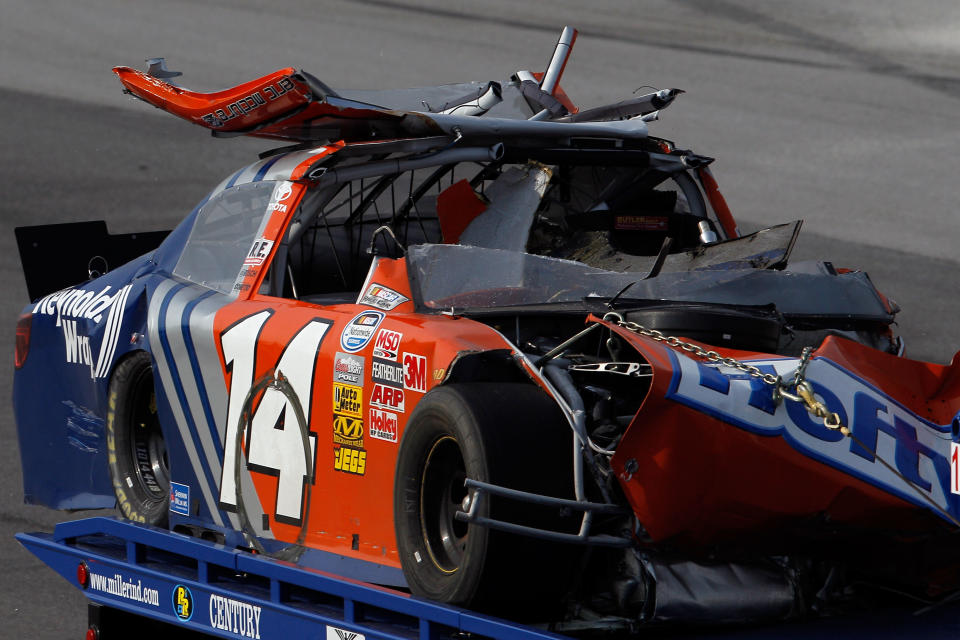 TALLADEGA, AL - MAY 05: The #14 Hefty/Reynolds Wrap Toyota of Eric McClure is removed from the track during the NASCAR Nationwide Series Aaron's 312 at Talladega Superspeedway on May 5, 2012 in Talladega, Alabama. (Photo by Chris Graythen/Getty Images for NASCAR)