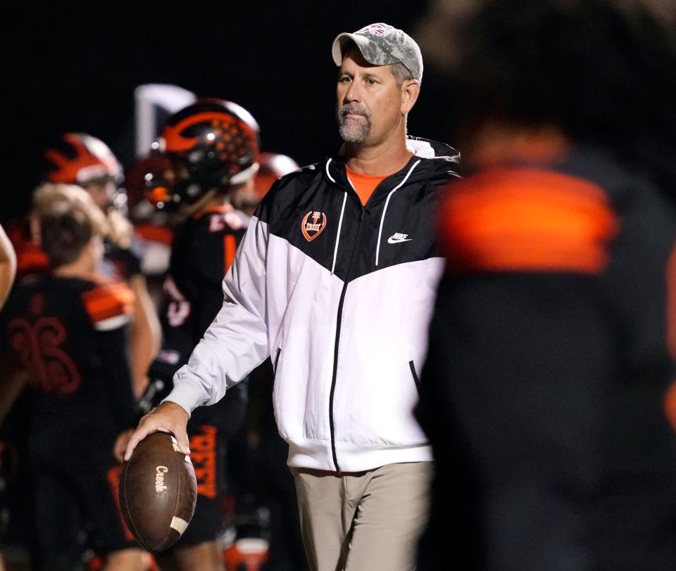 Spruce Creek head Coach Andy Price prepares his team for a playoff game with Nease at Spruce Creek High School in Port Orange, Friday, Nov. 12, 2021.