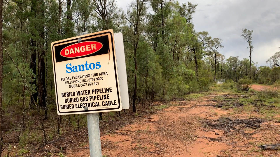 A Santos pipeline sign in the Pilliga State Forest.