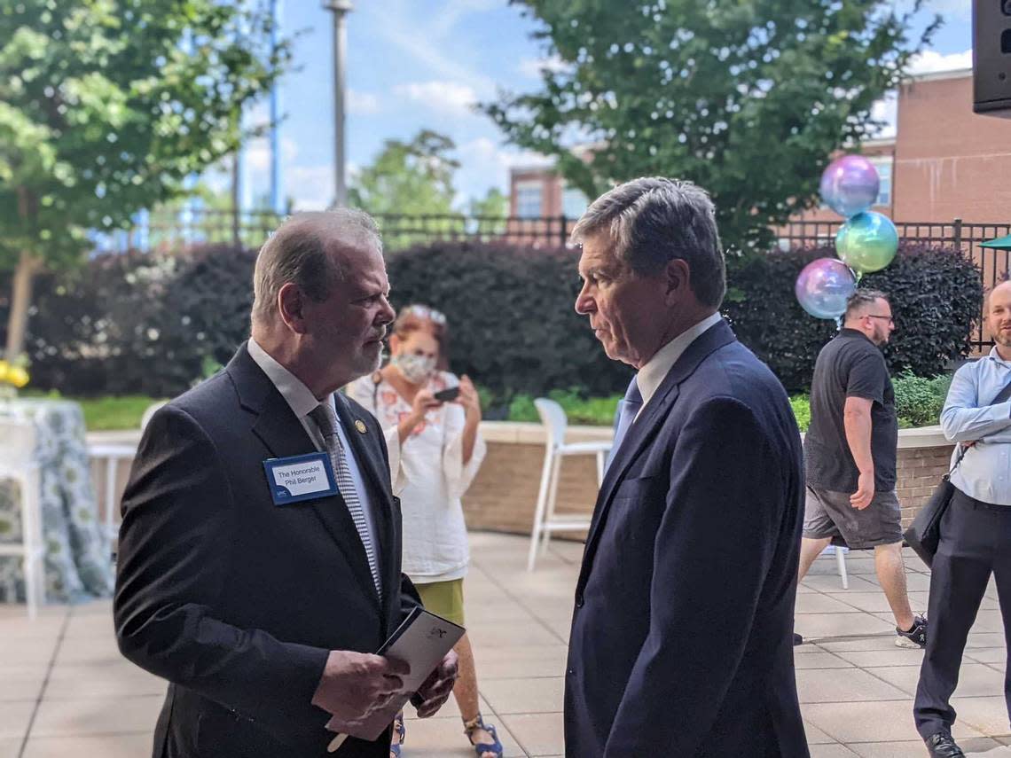 Senate leader Phil Berger, left, and Gov. Roy Cooper attend a dedication ceremony Monday, Sept. 19, 2022, at Chapel Hill’s N.C. Cancer Hospital, which was renamed in honor of the late North Carolina state Sen. Marc Basnight.