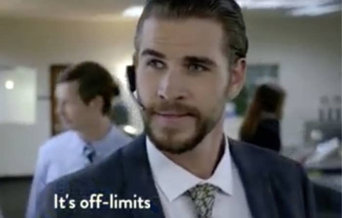 Man in a suit with tie looking forward, subtitle text reads "It's off-limits," office setting in background